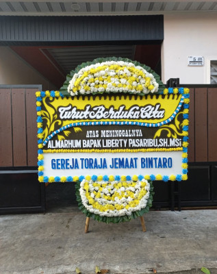 Papan Bunga Duka di Damping
